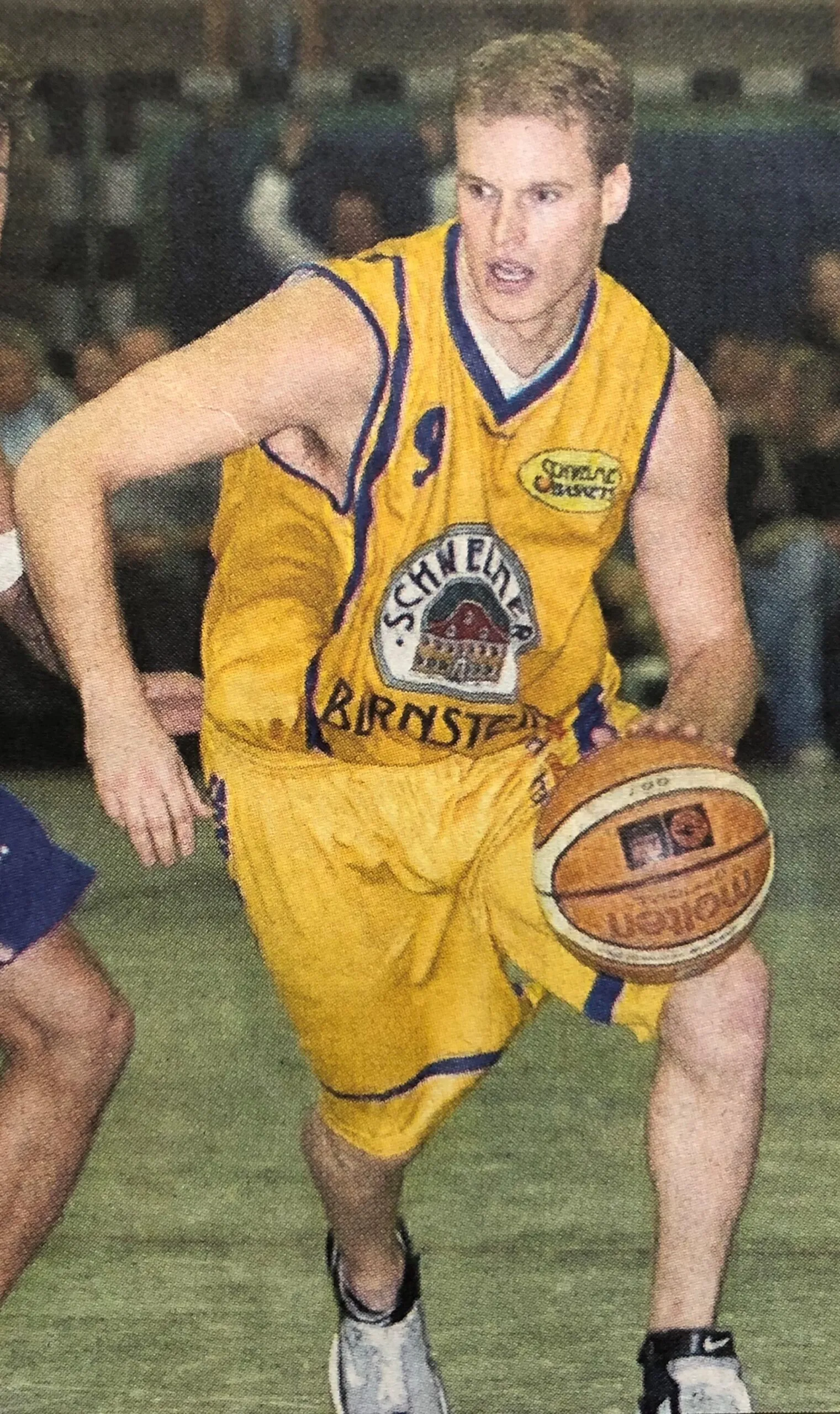 Eric dribbles past a defender
